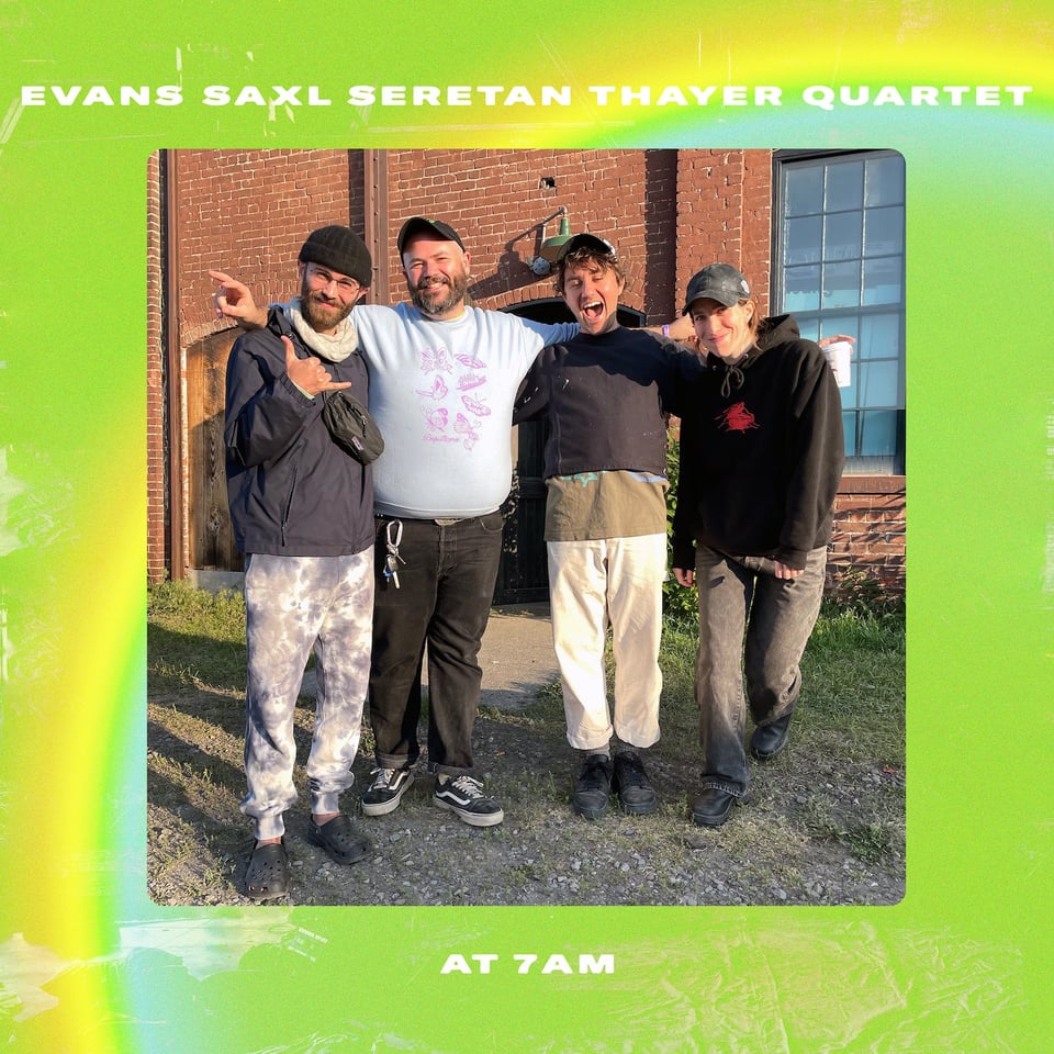 four goofy gobblers stand in a gravel parking lot at dawn