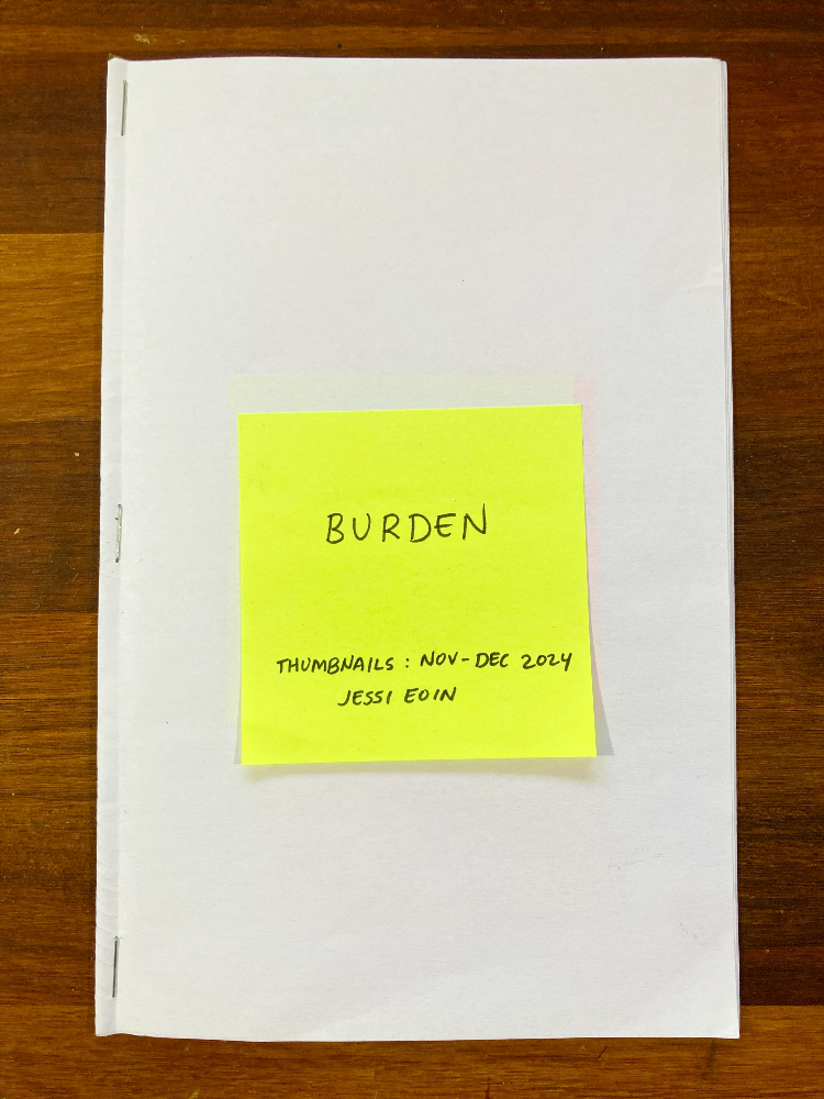 Cover for the thumbnails of the comic-in-progress Burden. A folded white piece of paper has been stapled together along the spine, and a bright yellow-green post-it note has been affixed to the front, reading,