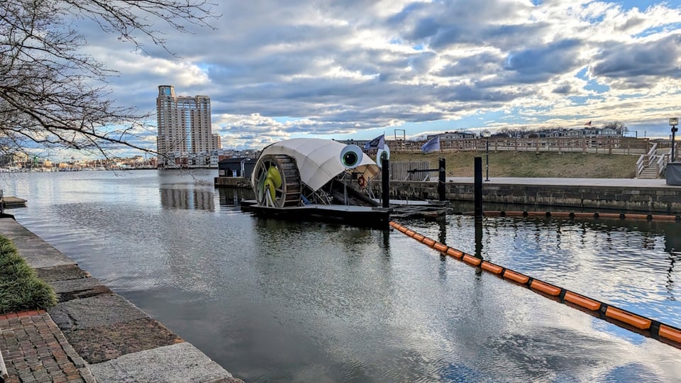 Mr. Trash Wheel sitting at the edge of the Inner Harbor