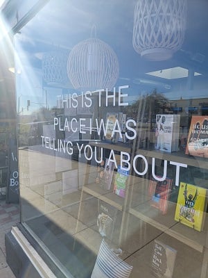 Octavias Bookshelf front window that has the words, “This is the place I was telling you about”