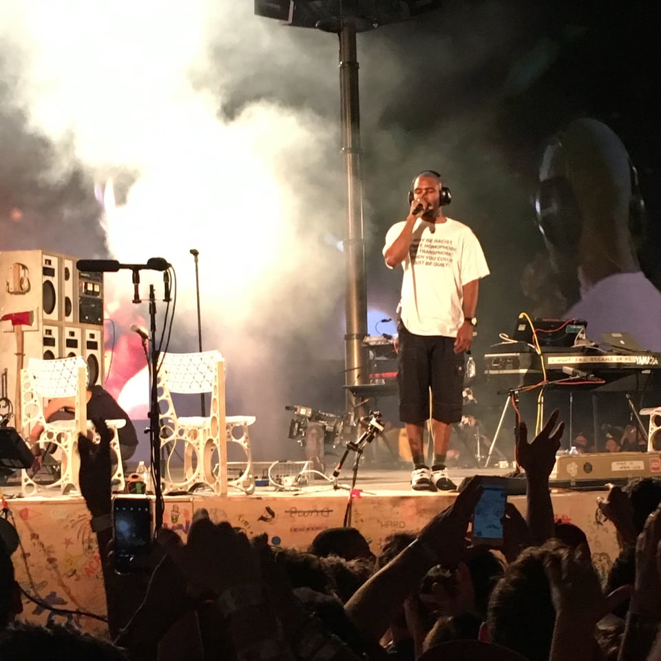 Frank performs as a crowd in front of him goes wild.
