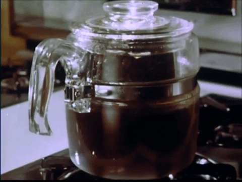 vintage glass coffee pot on stove percolating