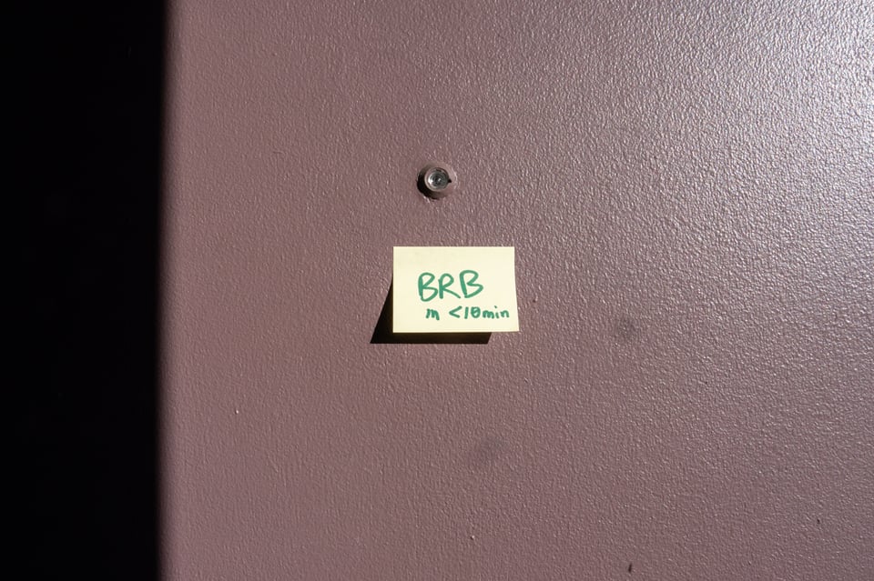 A sign on a door.