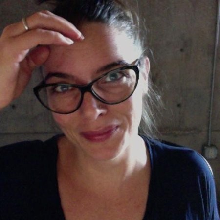 a woman wearing glasses