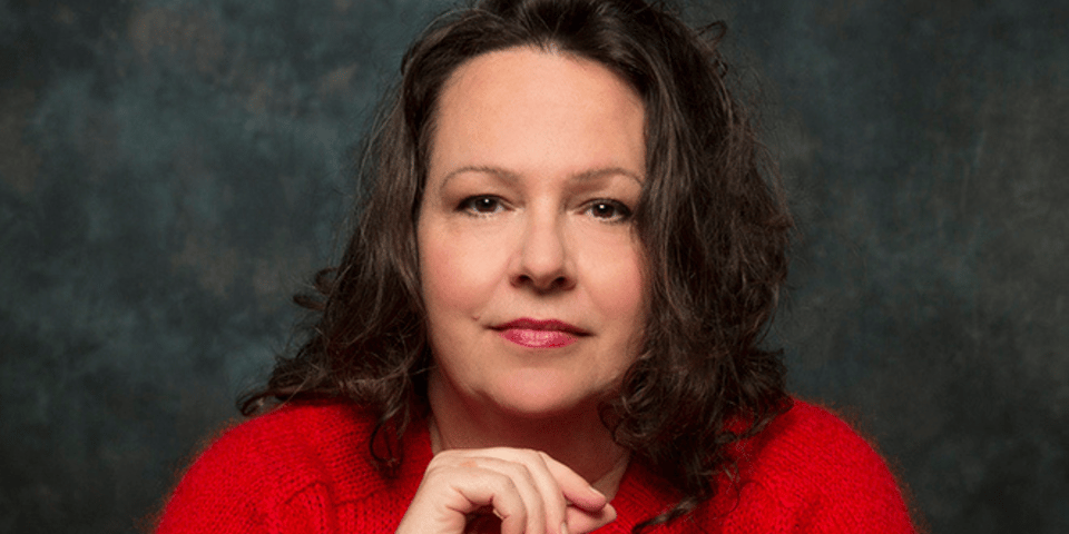 a headshot of Liz Allen