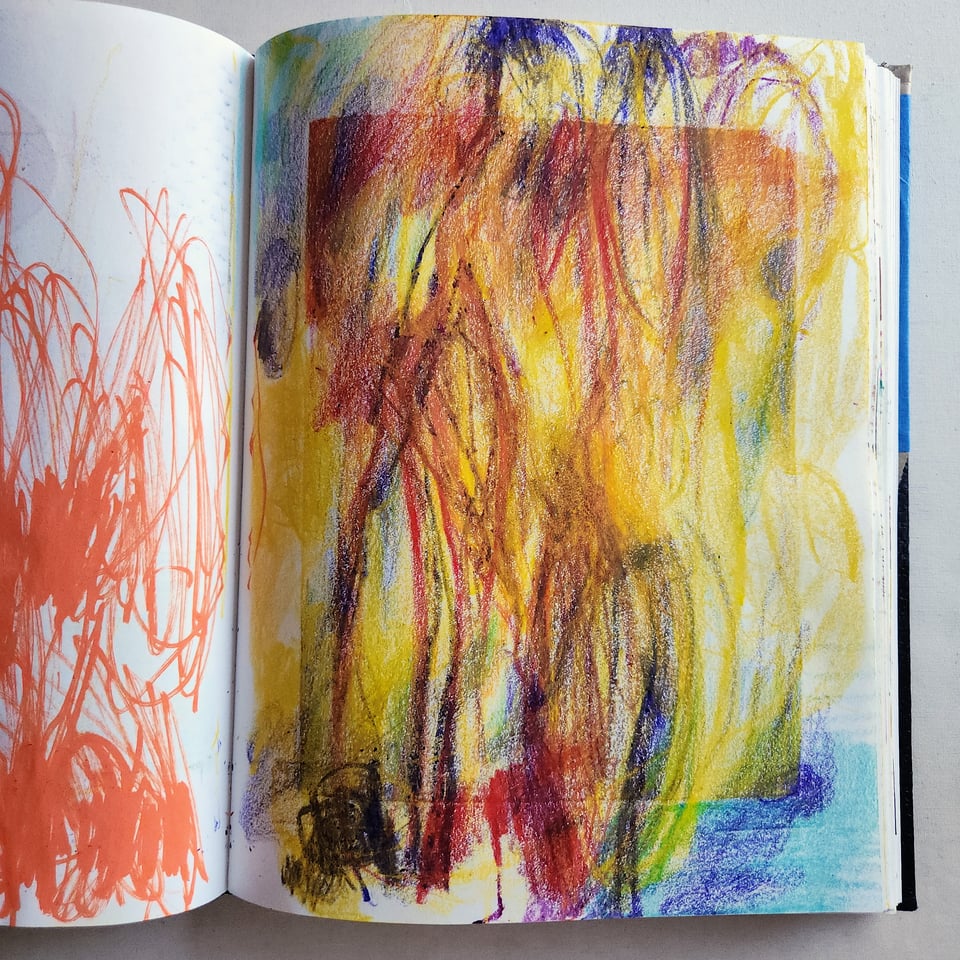 Photo of a page from Sarah's 2025 sketchbook. It's an expressive, scribbly drawing using crayon and other media.