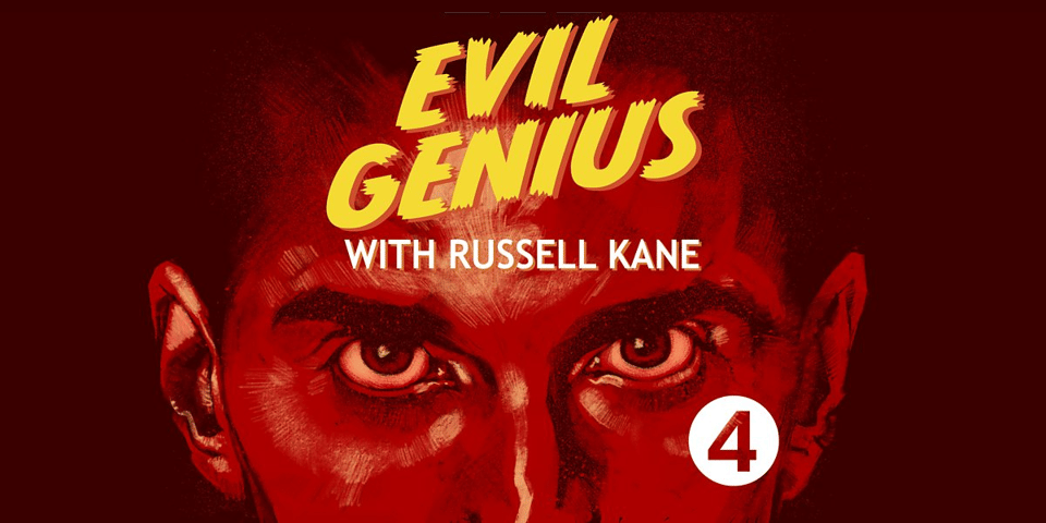 Russell Kane's face in red, looking evil.
