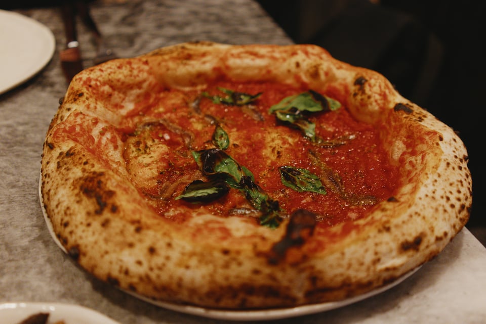 Damn. The main event. The pizza itself. It's nicely puffed on the crust, good specks of tasteful blisters.