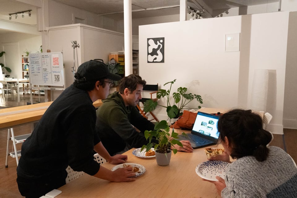 A group of people around a table.