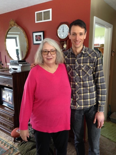 Photo of me standing next to my birth mother in March 2014