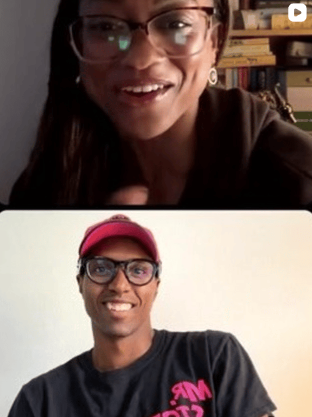 Screenshot of a video call with two people in stacked frames. The top frame shows a smiling woman wearing glasses in front of bookshelves, and the bottom frame shows a smiling man wearing glasses and a red cap against a plain background.