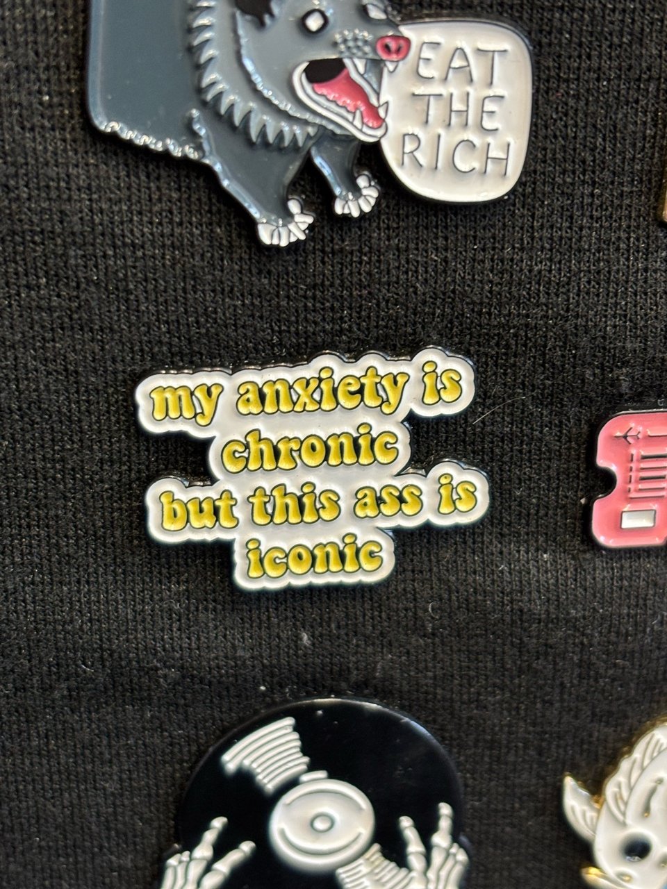 a pin on a pin board saying "my anxiety is chronic but this ass is iconic"