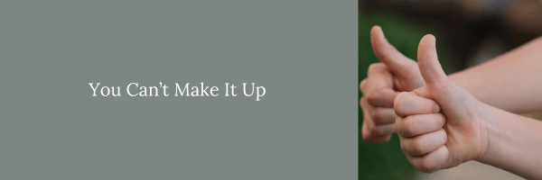 two hands with thumbs held up