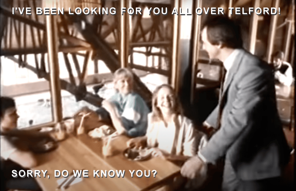 A image of three women in sports wear sitting at a cafe type table overlooking a swimming pool. A man has approached the table. Text at top reads: I've been looking for you all over Telford! Text at bottom reads: Sorry, do we know you?