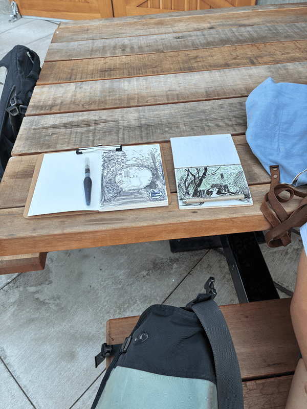 photo of sketches on table
