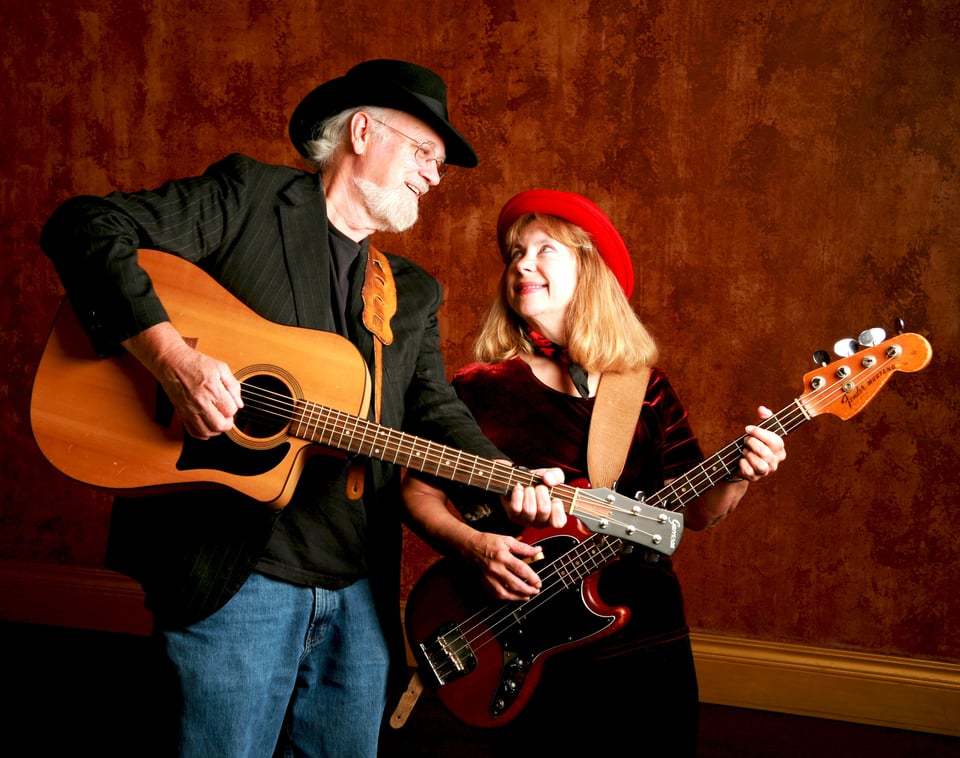 A Picture of Steve and Kristi Nebel with guitars