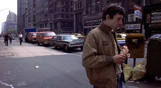 Travis Bickle walks down 7th ave in NYC, circa 1975