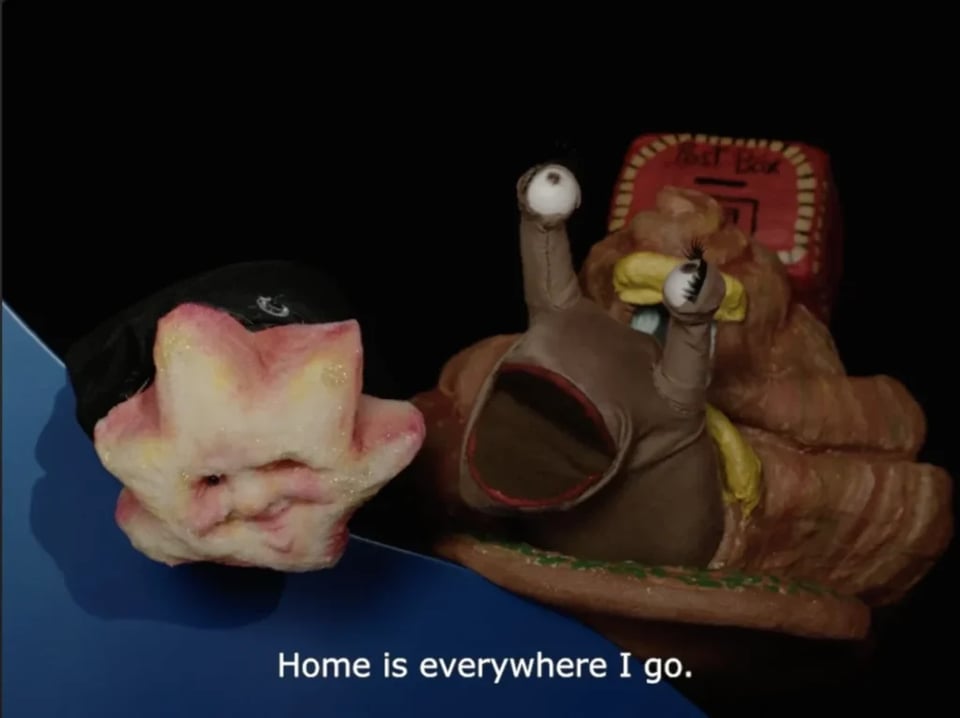 the sun and snail puppets