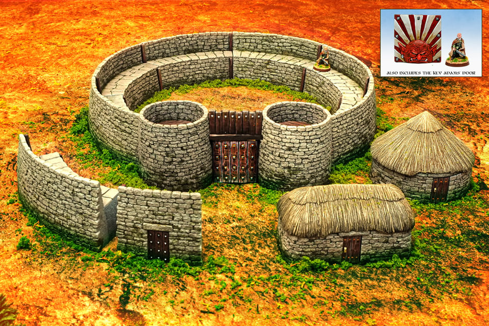 overhead three-quarters view of a multipiece resin ringfort posed alongside a blockhouse and roundhouse, plus spare wall section and gatehouse. there's an inset photo of an alternate gate featuring a red-and-white painted rising sun goblin sculpted by Kev Adams.