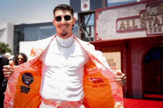Jarren Duran shos his jacket on the red carpet before the All-Star Game Tuesday. The inside says