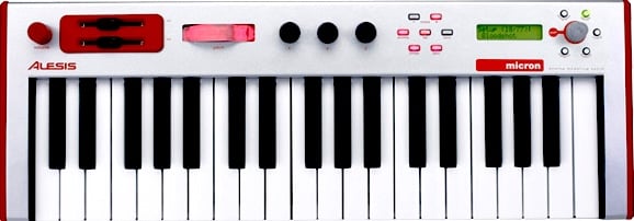 A synthesizer with 2 sliders four knobs and a very small 2-line LCD screen