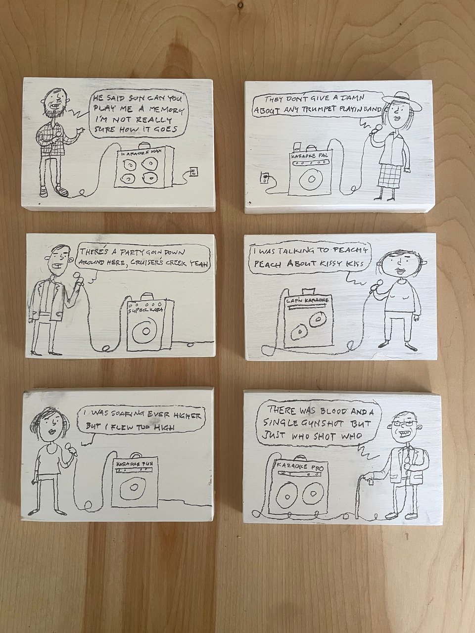 photo of six miniature paintings of people singing karaoke