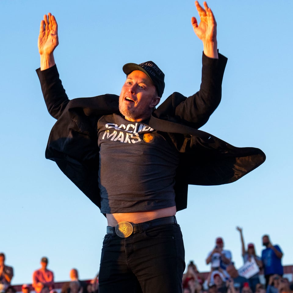 Elon Musk jumping like an idiot