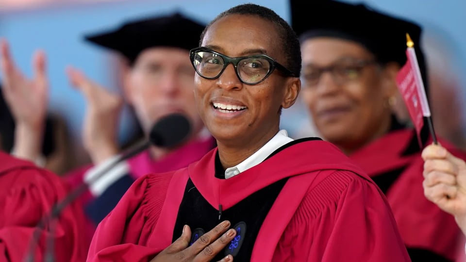 Gay in academic regalia at