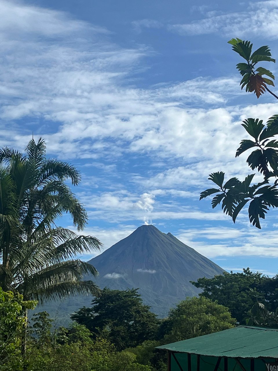Arenal Volcano in Costa Rica with a cloudy vista backdrop