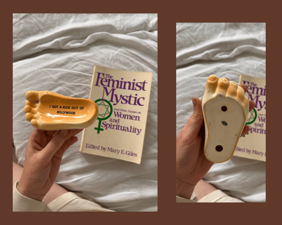 an ashtray that is shaped like a foot, with the text "i get a kick out of hollywood" written on it