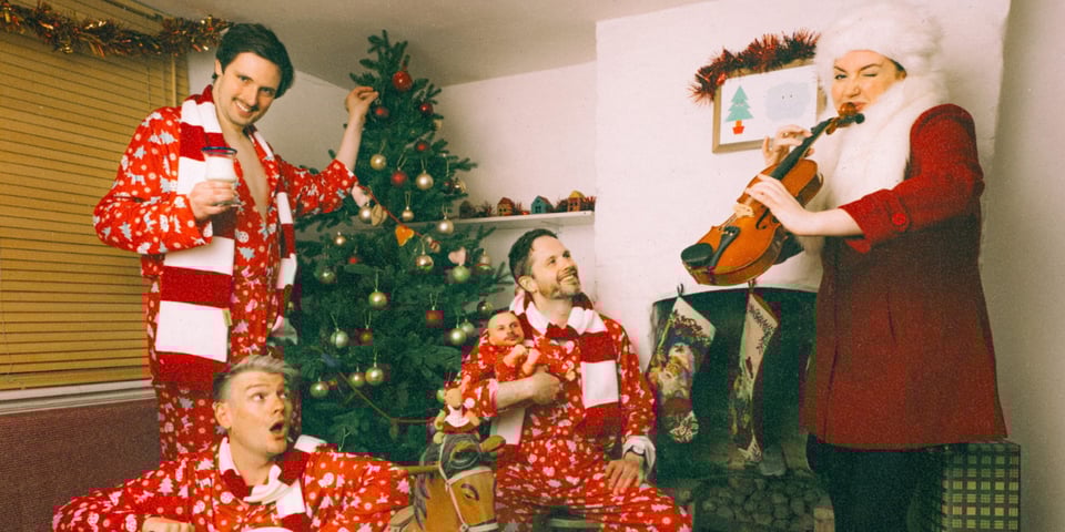The Sheeps and Katy Wix play festive instruments.
