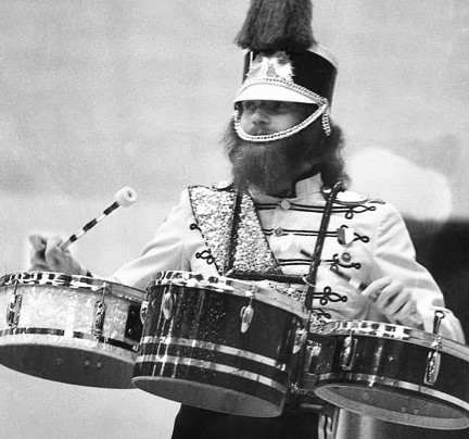 DIFFERENT DRUMMER—This is one of my favourite photos ever. It shows my college chum Bruce Lindsay, at the time a drummer for the Quorom Colour Guard band of Stoney Creek, Ontario. He tells me he won every “best drummer” trophy for two years with this group in several American and Canadian competitions on the colour-guard circuit.