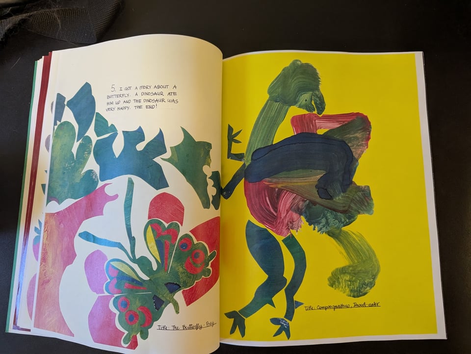 A child's rendition of a butterfly and dinosaur