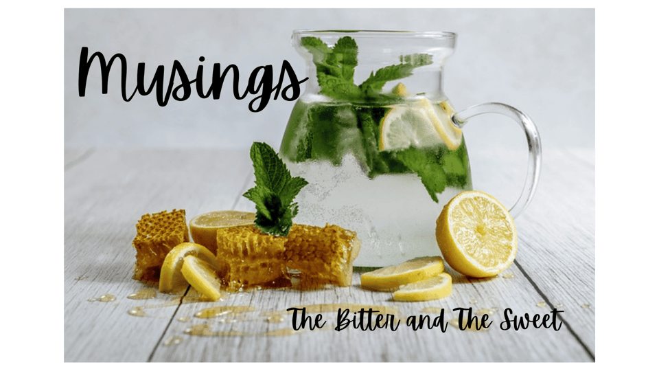 A clear glass pitcher pf water with mint leaves and a lemon slice. More lemon slices and some honeycomb plus mint leaves on a pale wooden plank surface. Text reads: Musings The Bitter and The Sweet