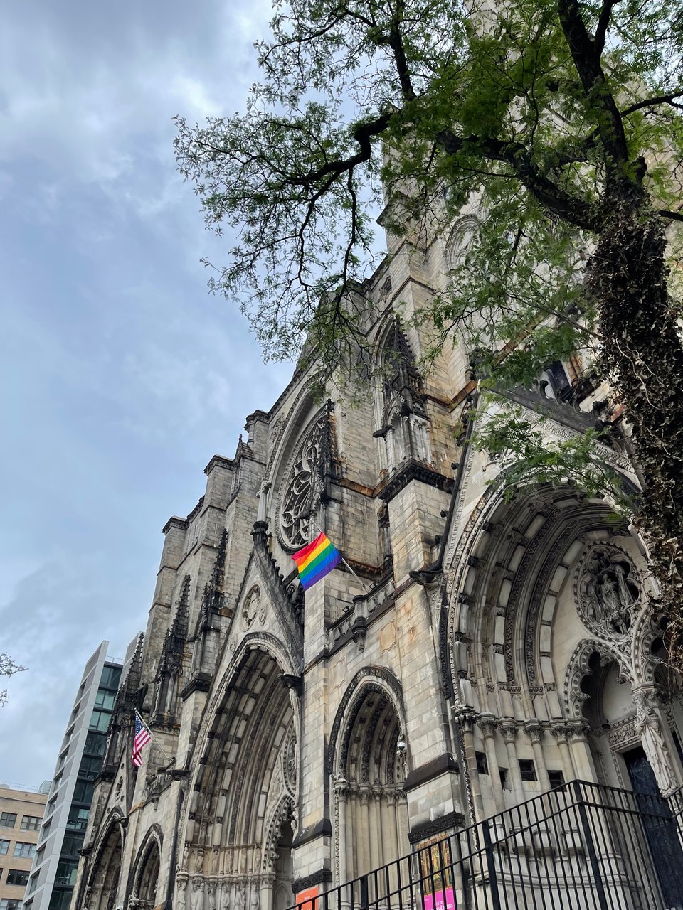 The Cathedral of St John the Devine, flying a rainbow pride flag