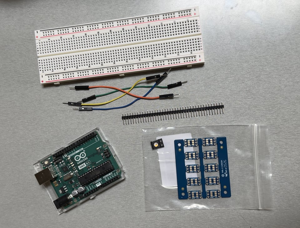 Various electronics supplies on gray table