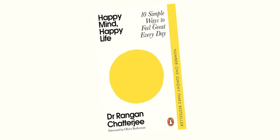 The cover of Happy Mind, Happy Life. A big yellow graphical sun.