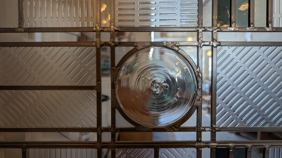 close-up view of the stained glass window at Luck Dragon