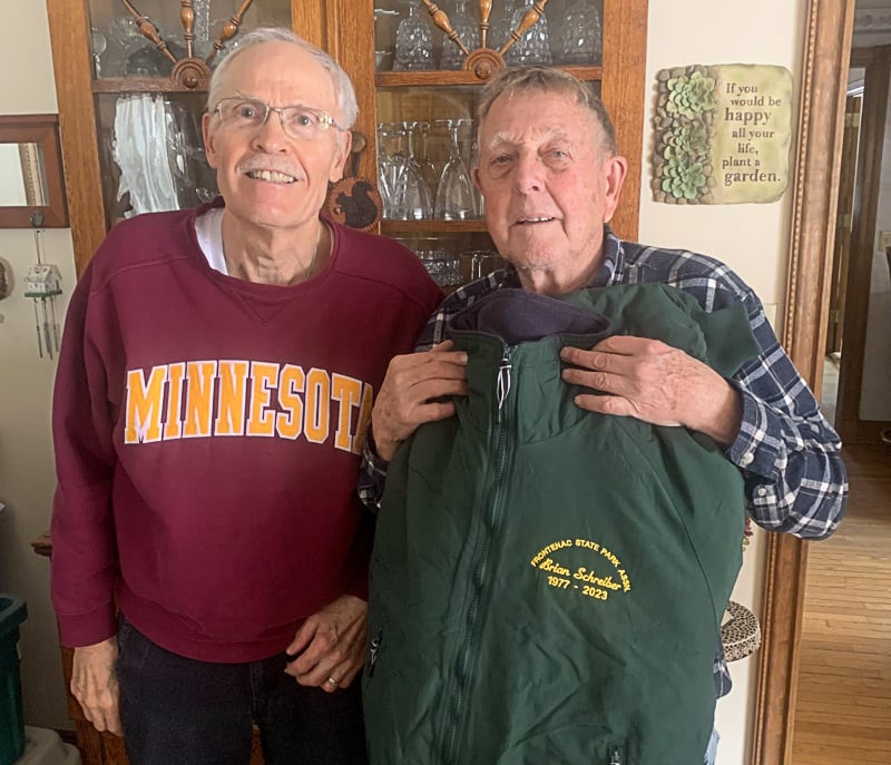 The Frontenac State Park Association recently presented this handsome jacket to Brian Schreiber to honor his many years of service to the FSPA. Brian was a pivotal leader of our group from 1977 to 2023. To his right is Harry Roberts (park manager from 1987 to 2013), another pillar of the park and our organization. Honored to know them both! / Photo by Wally Siewert