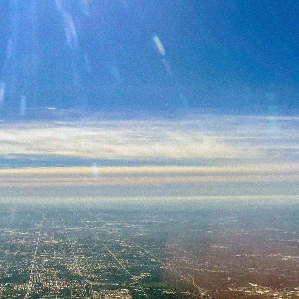 a photo of suburban Chicago seen from an airplane window