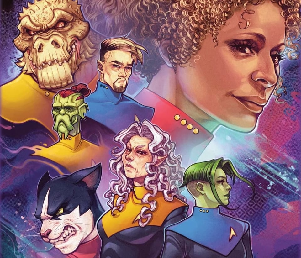 A whole bunch of faces against a colorful background, including Raffi Musiker, D'Vana Tendi, an elderly Vulcan lady, a cat guy, a green Pandronian and a big lizard guy.