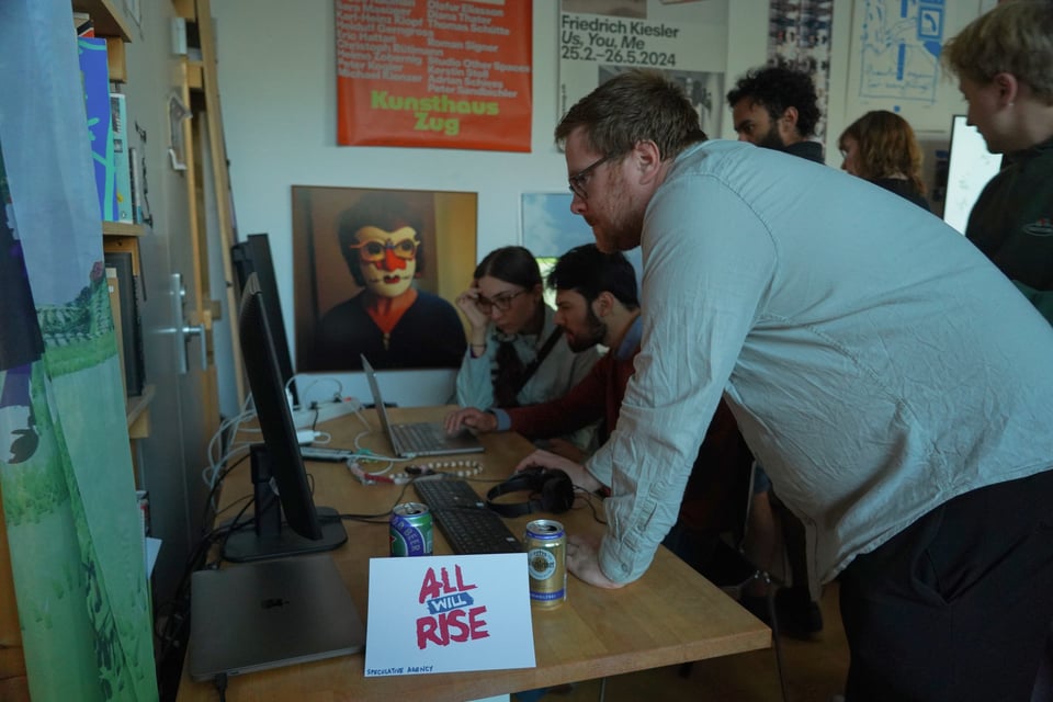 A group of people play a videogame on a screen