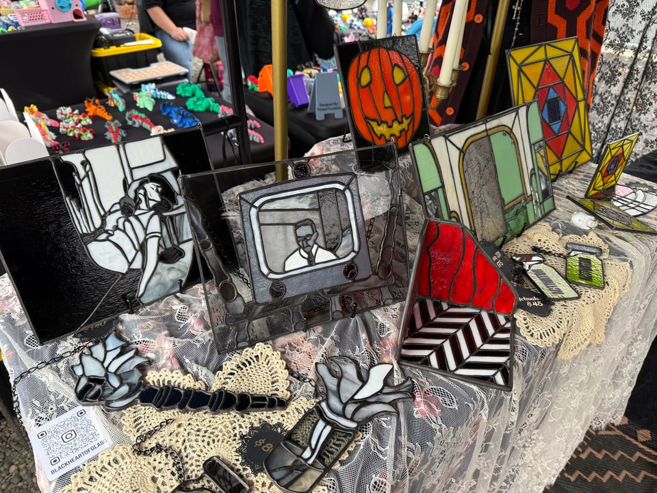 Stained glass art showing scenes from Night of the Living Dead and Twin Peaks