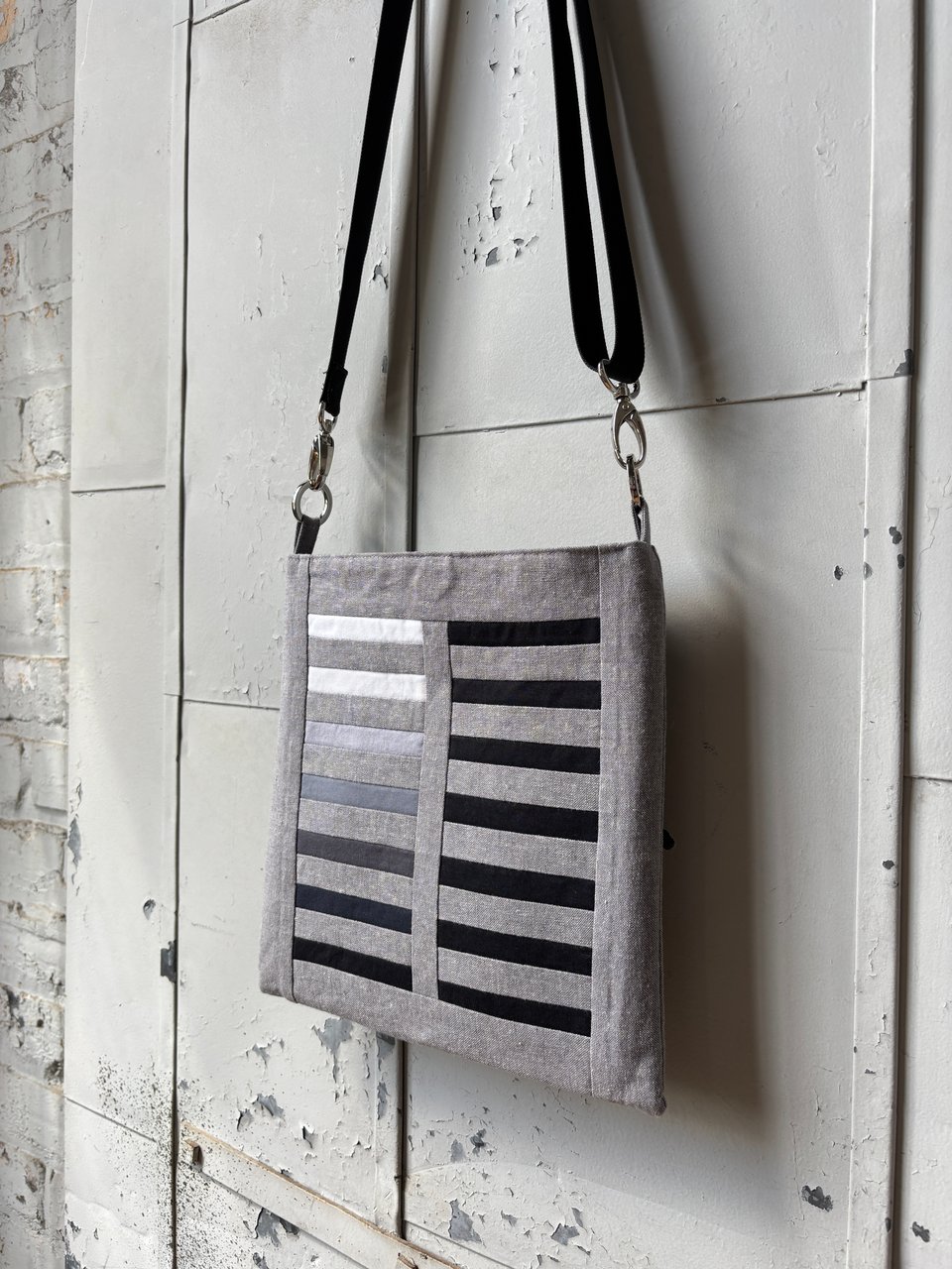 Reveal Cross Body purse by Mary Pow