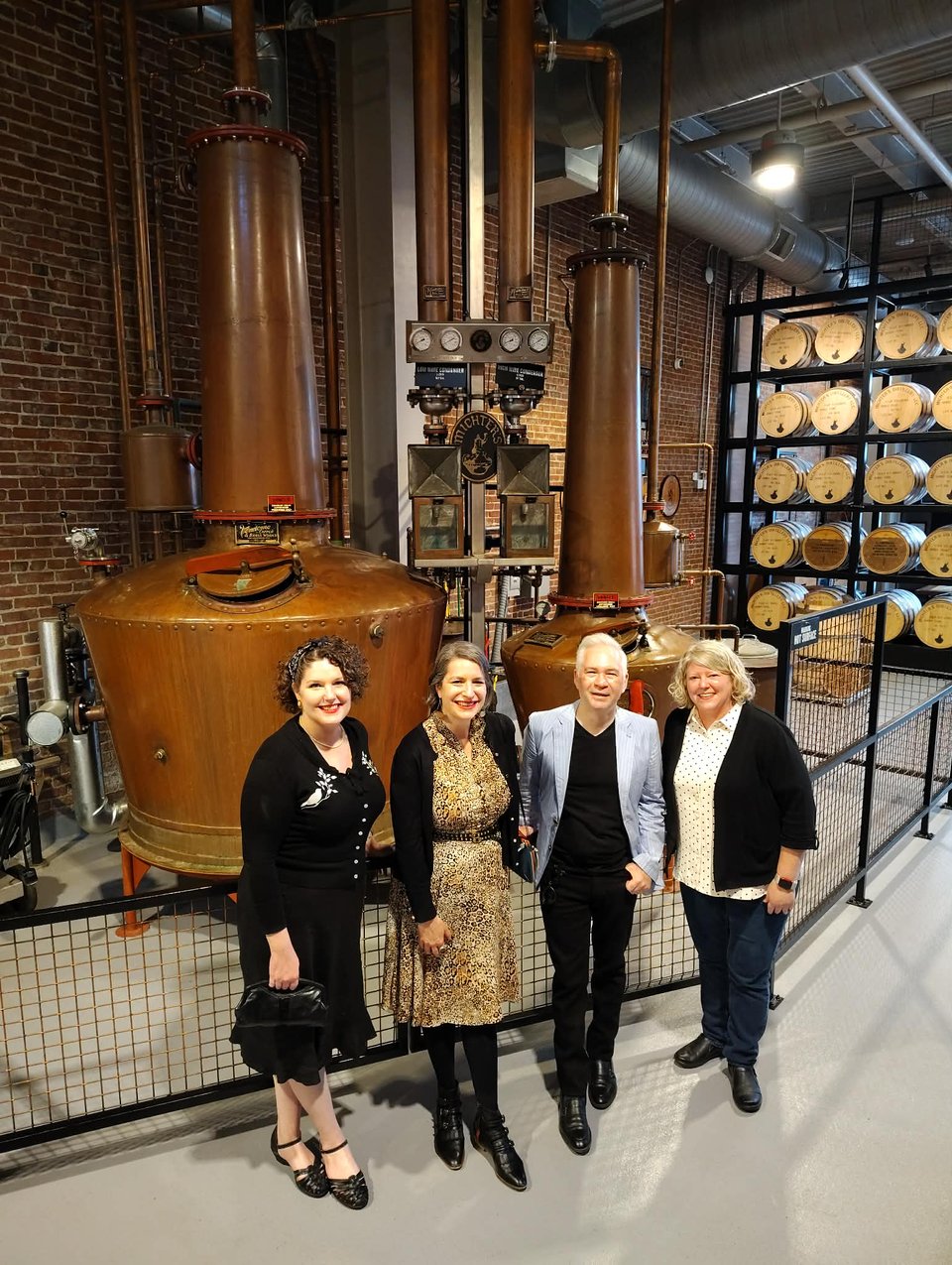 whiskey writers posing at the Michter's Fort Nelson distillery, Louisville