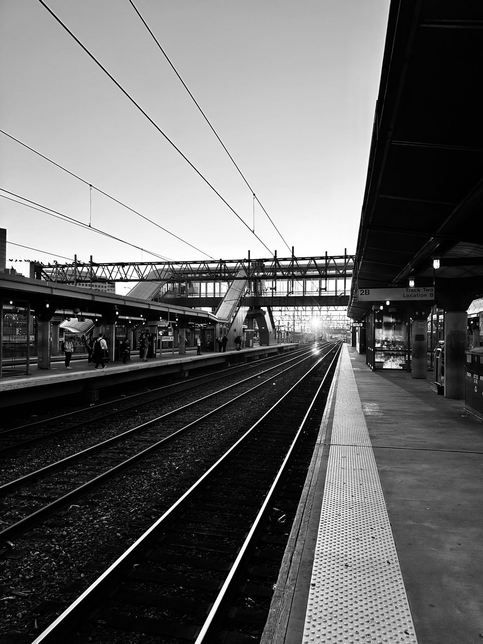 B/w photo of track 2 at Stamford, CT train station, waiting on the Acela to Boston