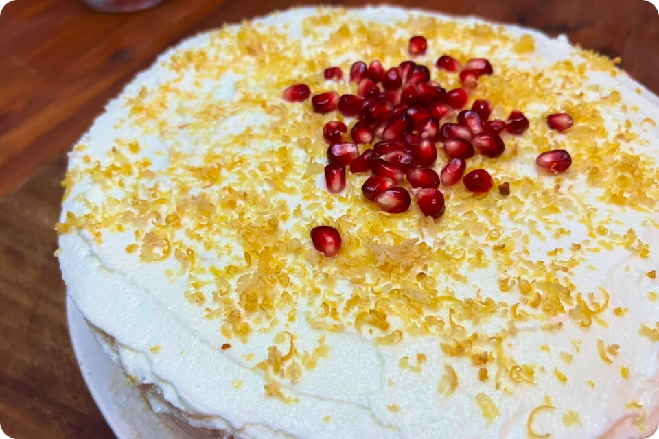 a lemon cake with pomogranate