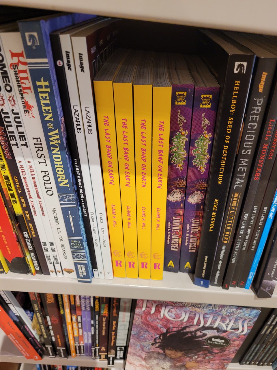 A photo of four copies of Last Band On Earth on the shelf at Indigo, the largest bookstore chain in Canada. It’s right between an Image book called Lazarus and a Harper Alley book called Les Normaux.
