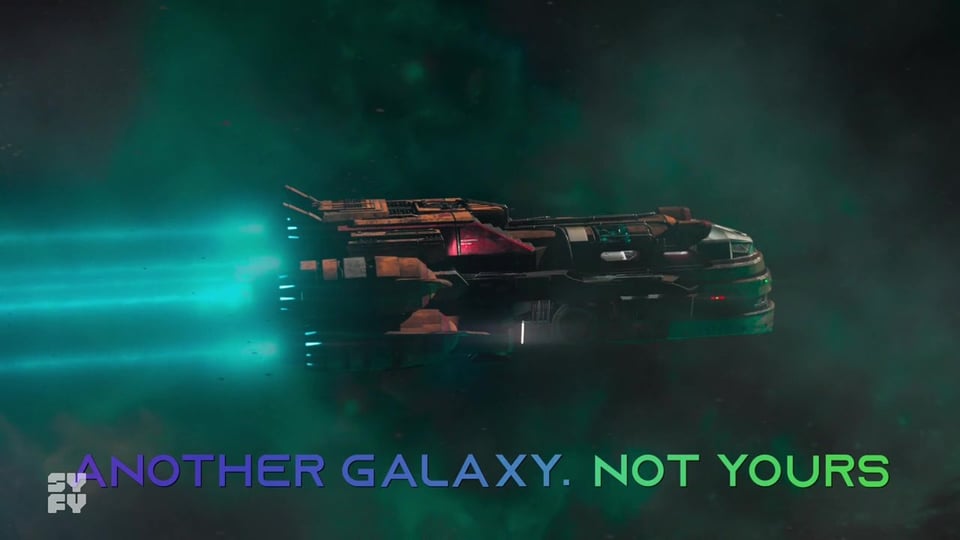 A screenshot from the TV show Vagrant Queen, featuring a spaceship zoomin thru a green cloudy thing, with a caption that says ANOTHER GALAXY. NOT YOURS