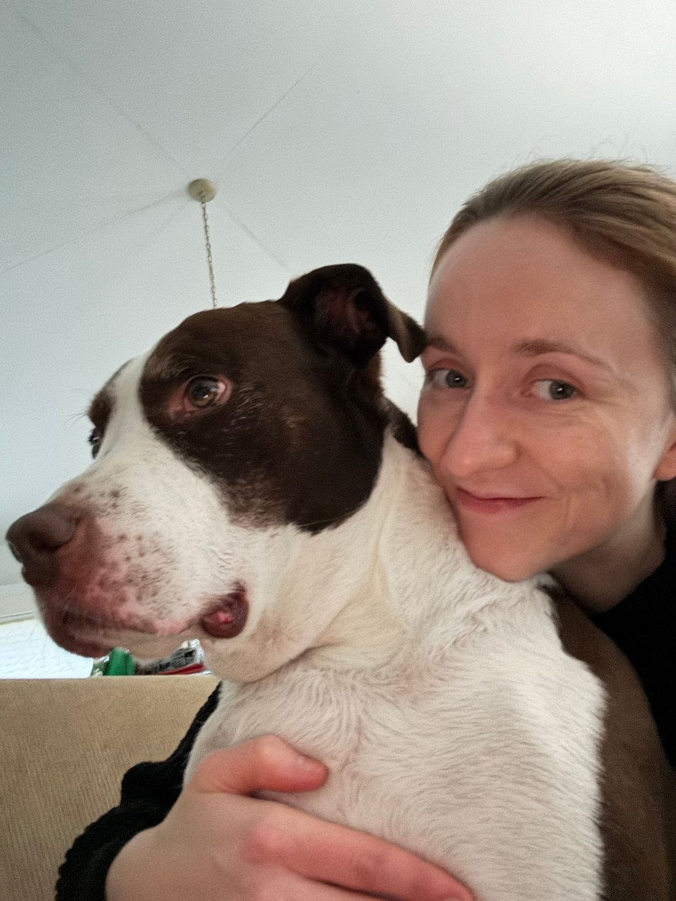 Me and Charlie, a brown and white dog -- only one of us is looking at the camera and it isn't him